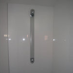 Minimalist white shower cubicle interior inside modern washroom shepherds hut