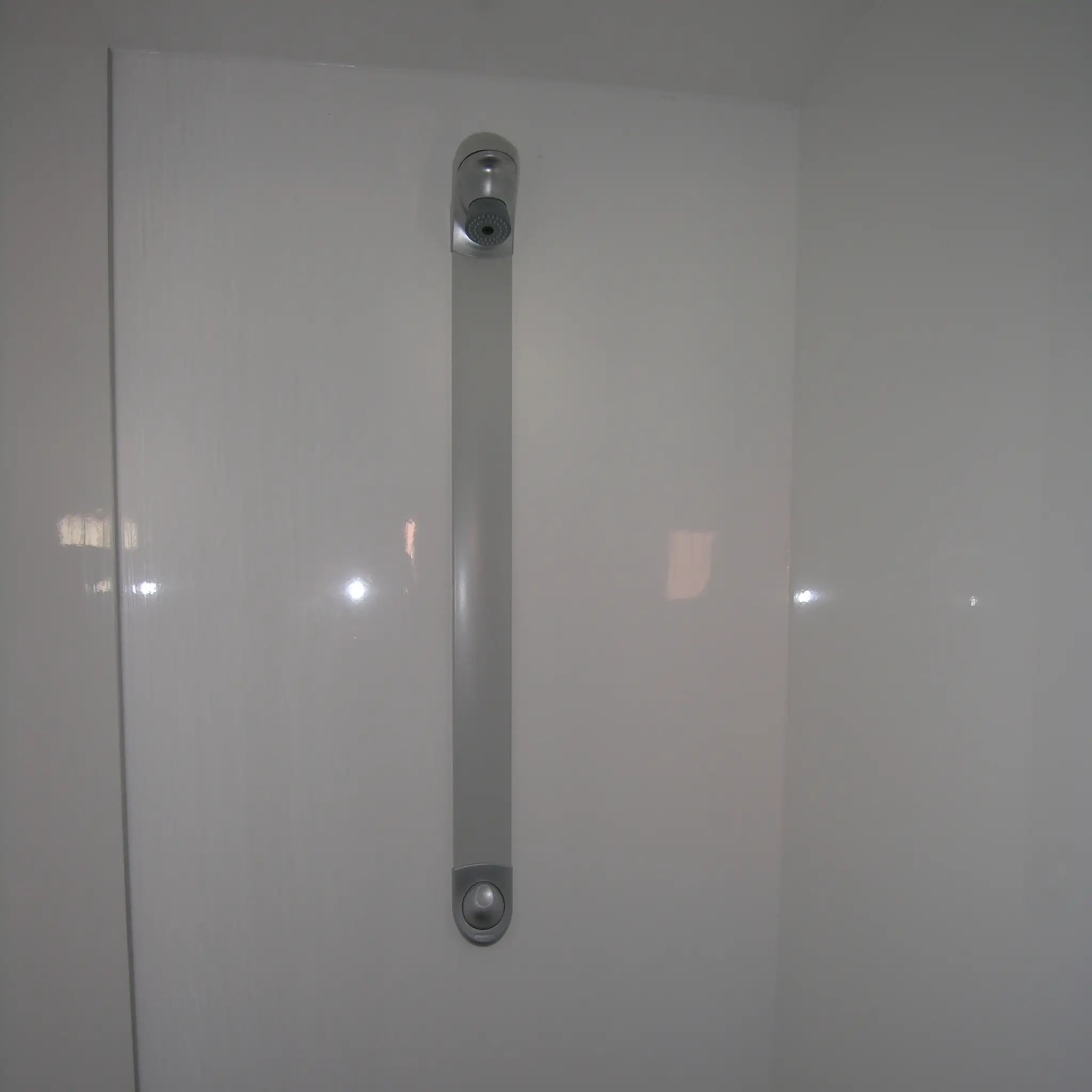 Minimalist white shower cubicle interior inside modern washroom shepherds hut