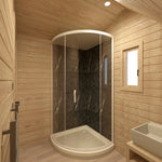 Luxury glamping pod bathroom interior with modern shower enclosure, vanity sink, wood-paneled walls and compact washroom layout.