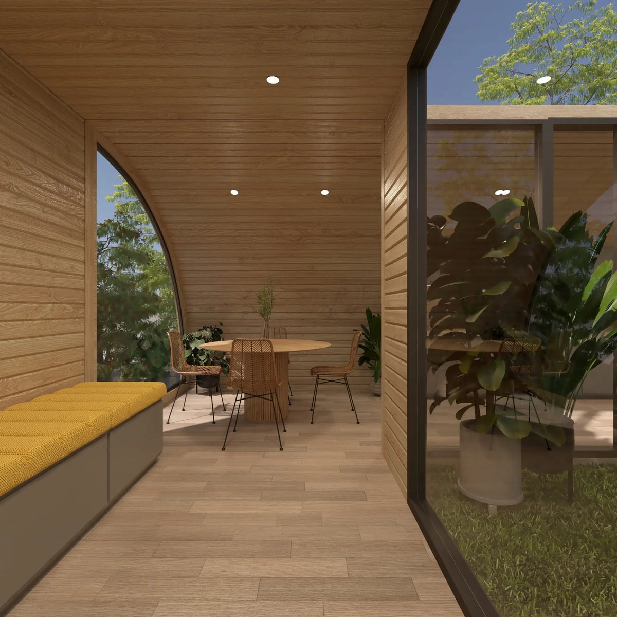 Timber-lined dining area with built-in bench seating, courtyard glazing and four-person dining table inside the ultimate 2 person glamping pod.