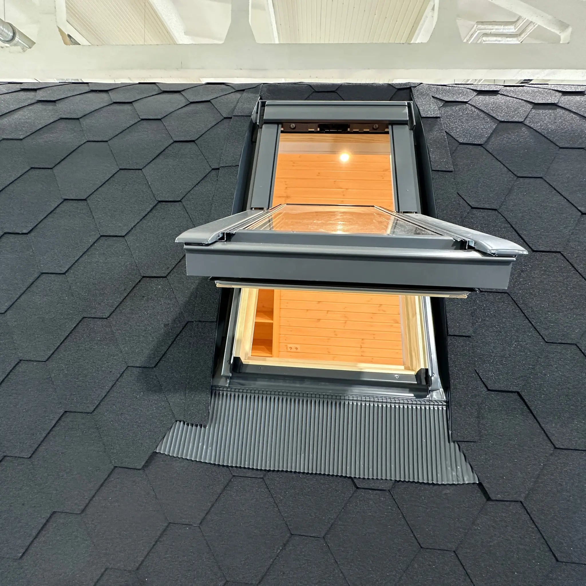 Exterior view of The Twilight Pod with VELUX window open, allowing natural light into the luxury glamping pod