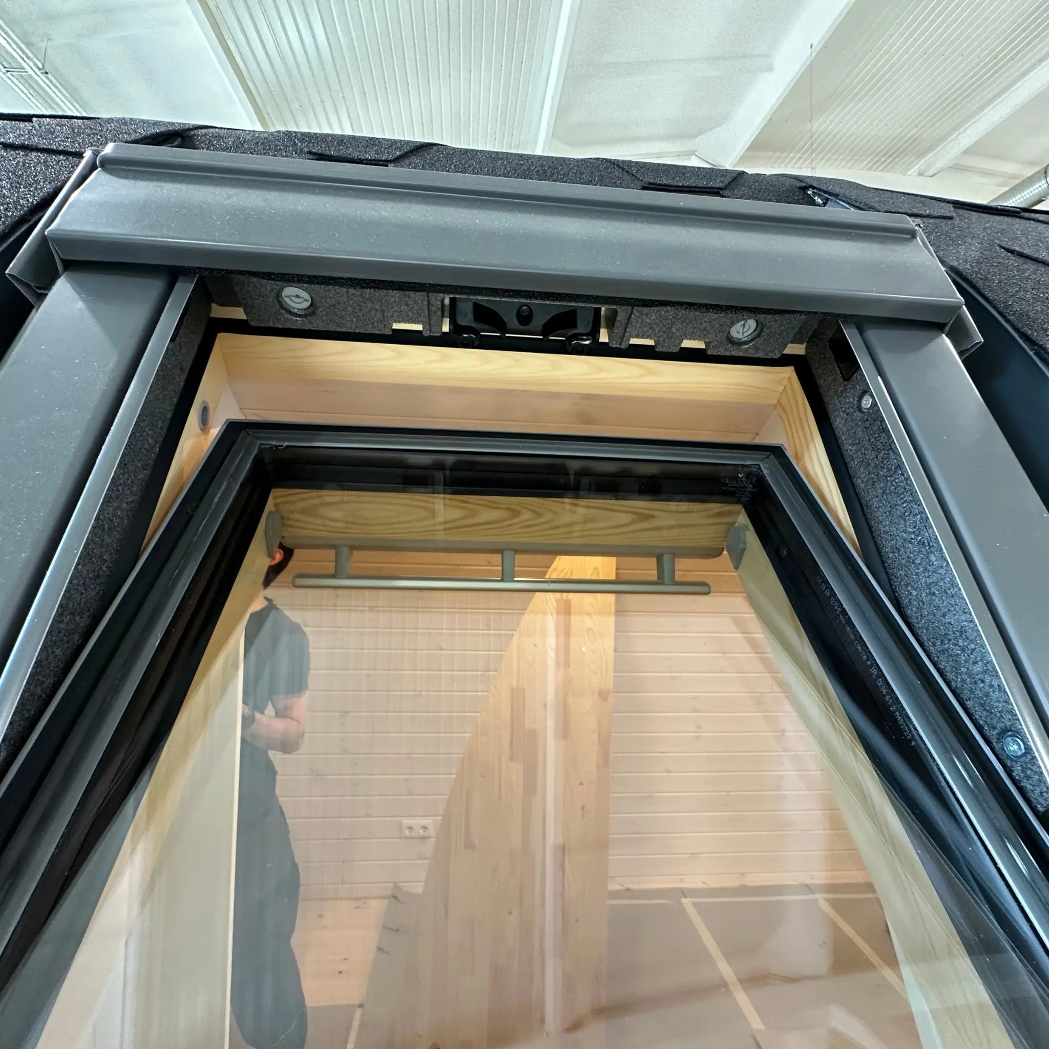 Close-up of open VELUX roof window on The Twilight Pod showing premium roofing and weatherproof detailing