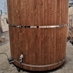 Exterior commando power socket positioned near the base of The Washwood Barrel.