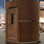 Side exterior view of the Washwood Barrel showing vertical timber finish and steel bands