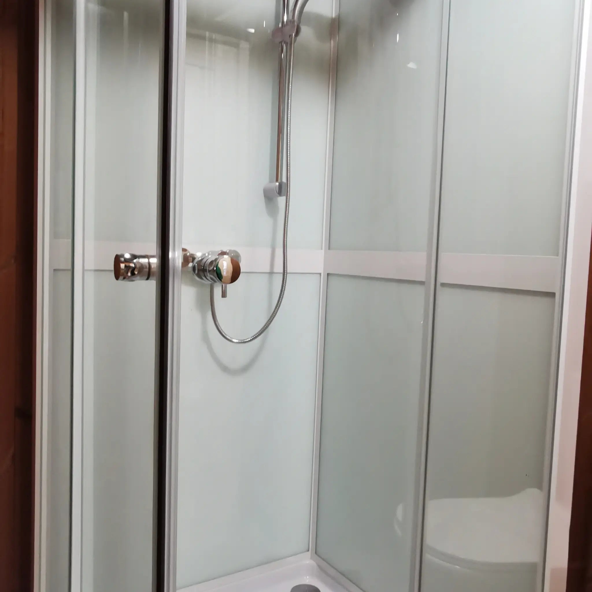 Full shower cubicle view with frosted panels inside the Washwood Barrel
