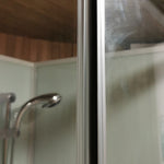 Frosted glass shower panel detail in Washwood Barrel bathroom