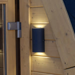 Exterior wall light detail on Hobbit garden office pod showing modern outdoor lighting on natural timber cladding