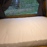 Close-up of premium Komfi Unity pocket mattress inside Hobbit pod showing comfort and sleeping quality