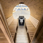 Luxury 8 person barrel sauna interior with panoramic full glass wall and wood-burning sauna heater