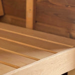 Close-up of premium alder sauna bench seating inside the Infinity Glass luxury barrel sauna