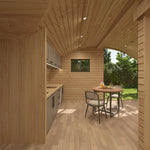 Kitchen and dining area inside the Moonburrow Pod luxury 2-person glamping pod, featuring a curved timber interior and panoramic window overlooking nature.