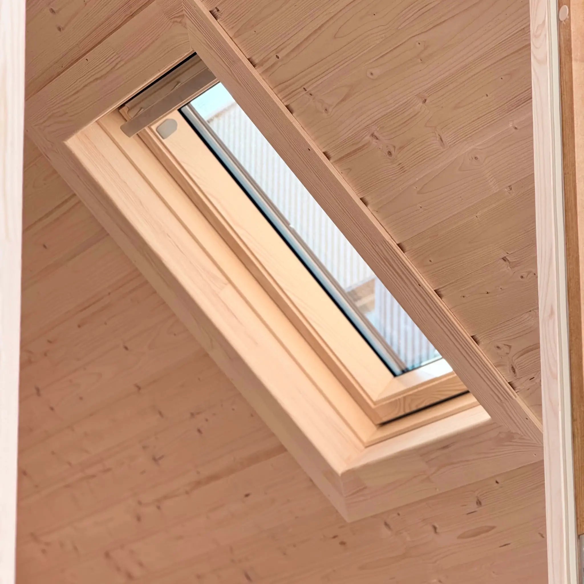 Rooflight window inside The Ridgefall Pod 2 person glamping pod allowing natural light into the timber-lined interior.