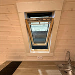 Interior view of the VELUX roof window inside the Twilight Pod allowing natural light into the kitchen and living space