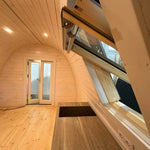 Interior kitchen counter with built-in cabinetry and VELUX roof window inside the Twilight luxury 2 person glamping pod