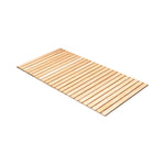 Natural black alder wooden slatted floor mat for sauna and bathroom on white background