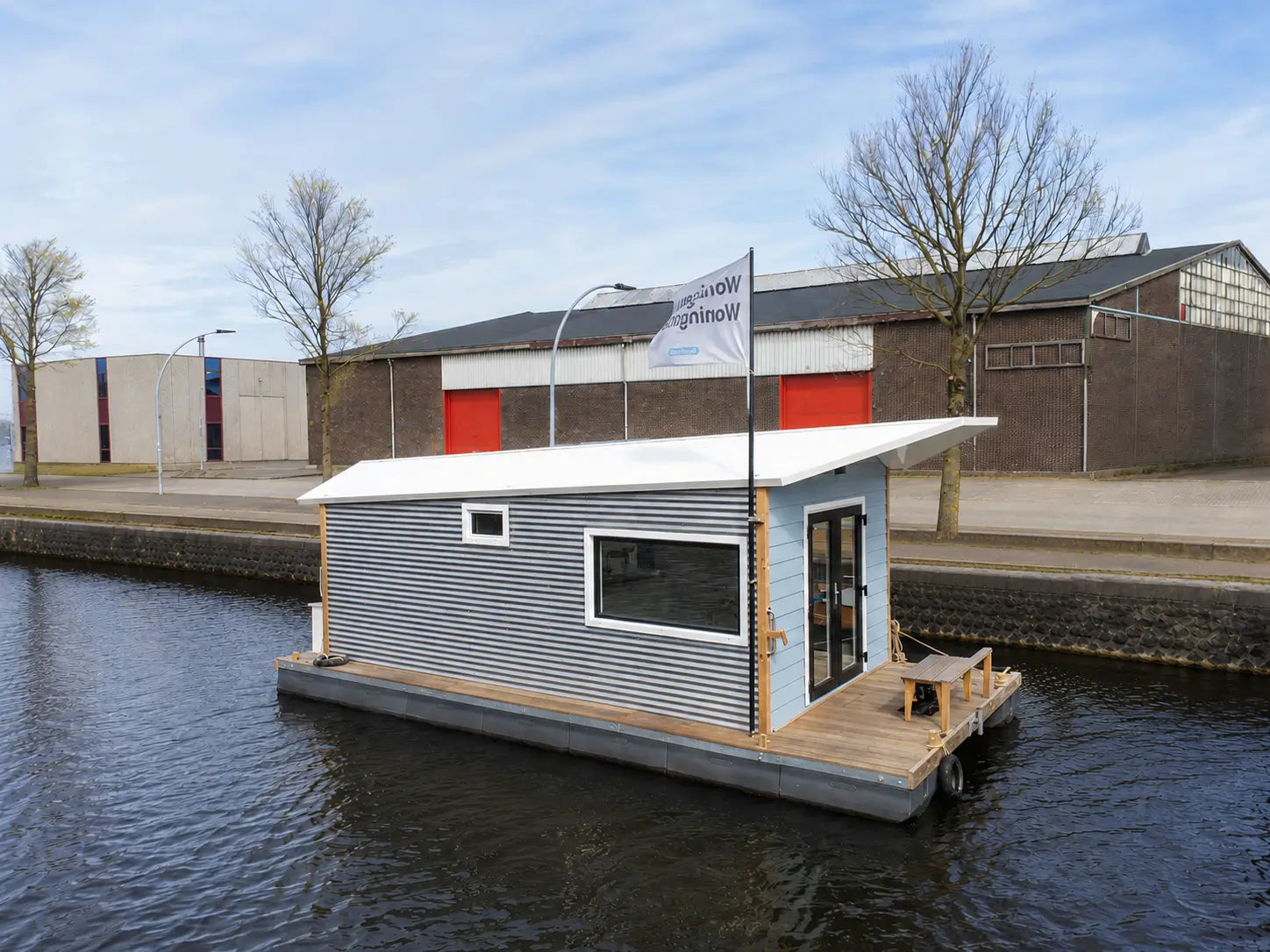 Premium floating glamping pod and houseboat accommodation supplied by GlampLaunch, featuring a contemporary floating structure, waterside guest experience, private decking, and modern living space. Ideal for marinas, glamping sites, holiday parks, lakeside developments, canals, and waterfront hospitality projects across the UK and Europe.