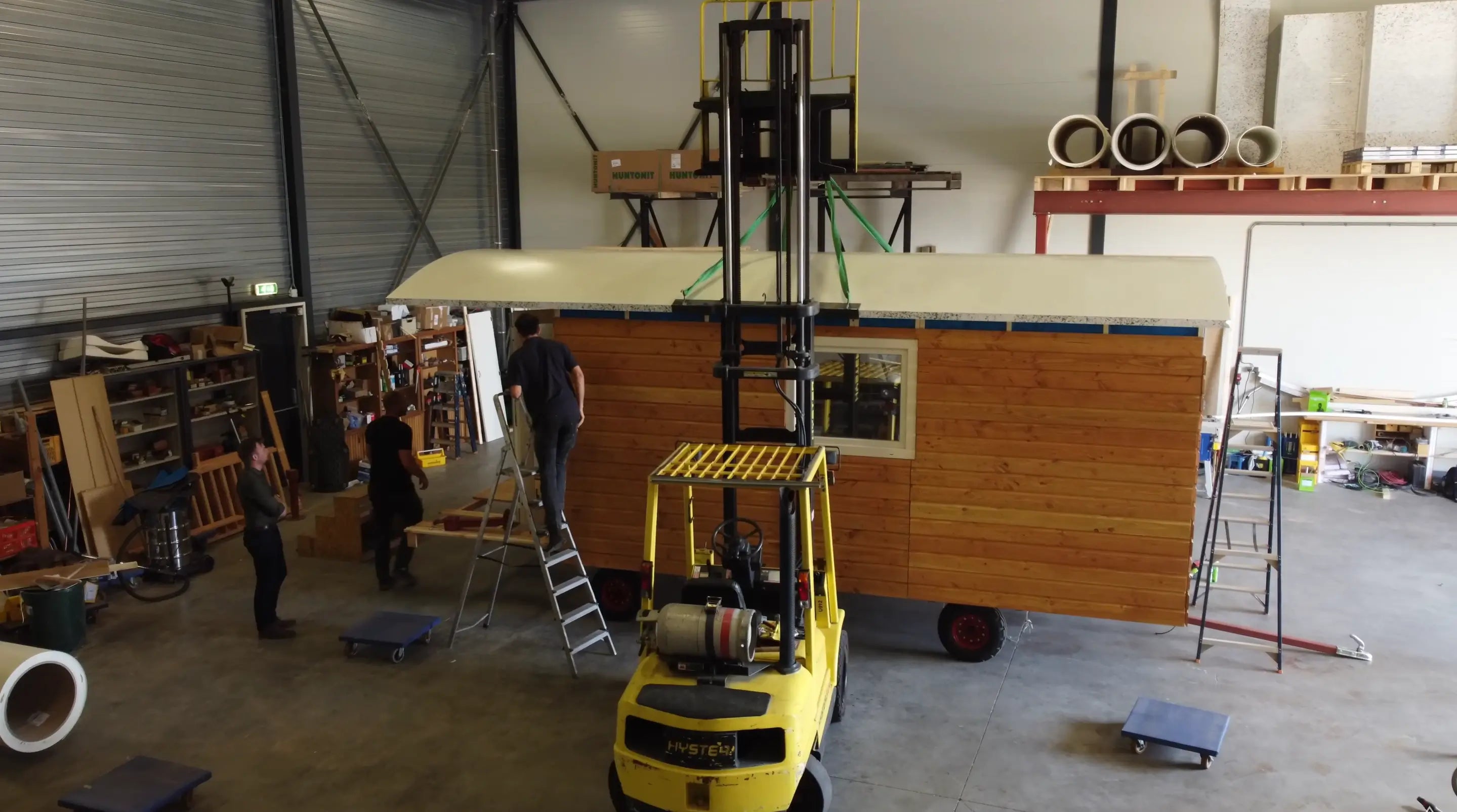 Taylor Glass visiting a supplier factory in the Netherlands to onboard bespoke shepherd huts and floating glamping boats into the GlampLaunch product range in April 2026.