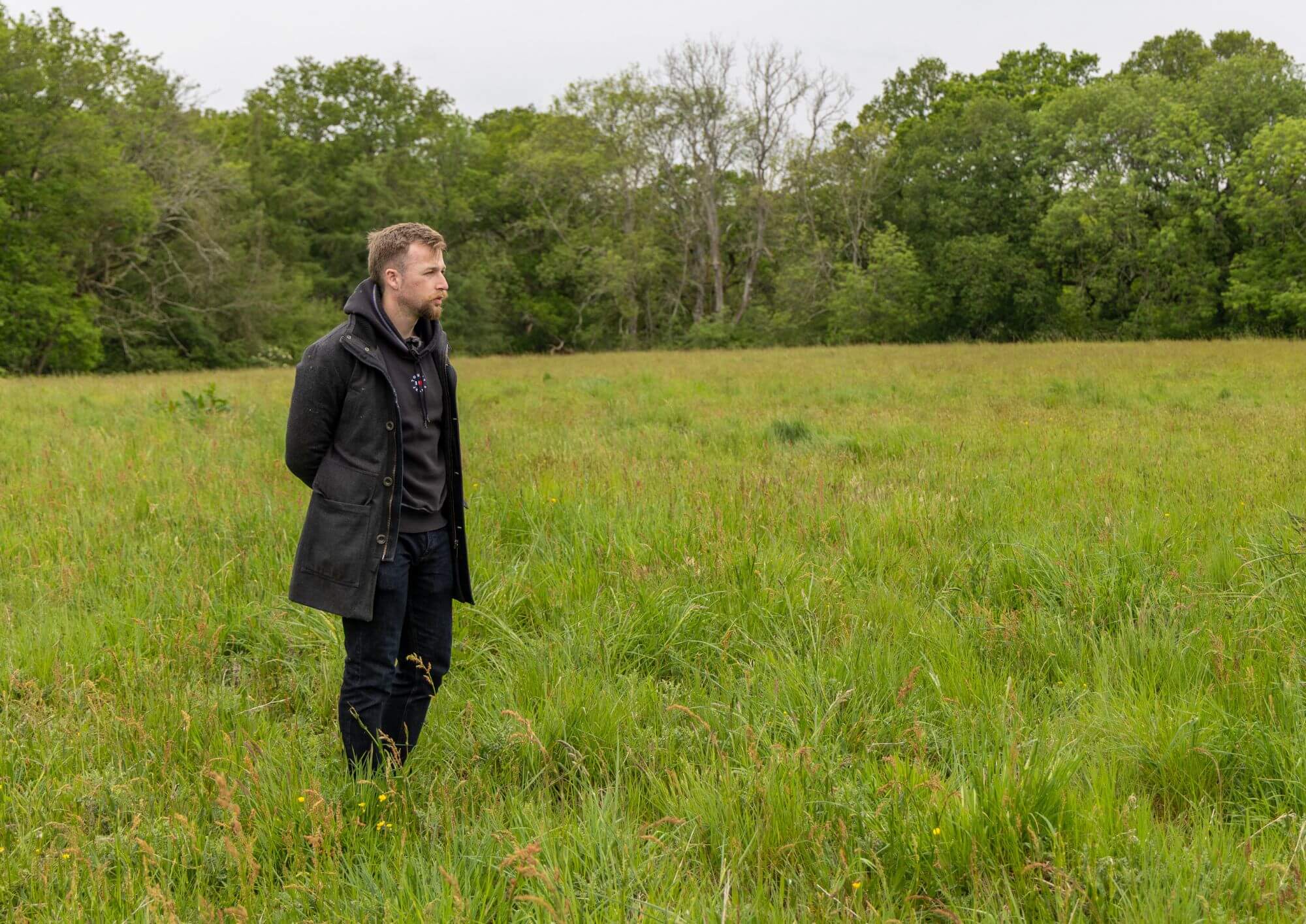 Taylor Glass walking through the proposed West Riddens development site while assessing land suitability, infrastructure requirements, and project feasibility for a future hospitality development.